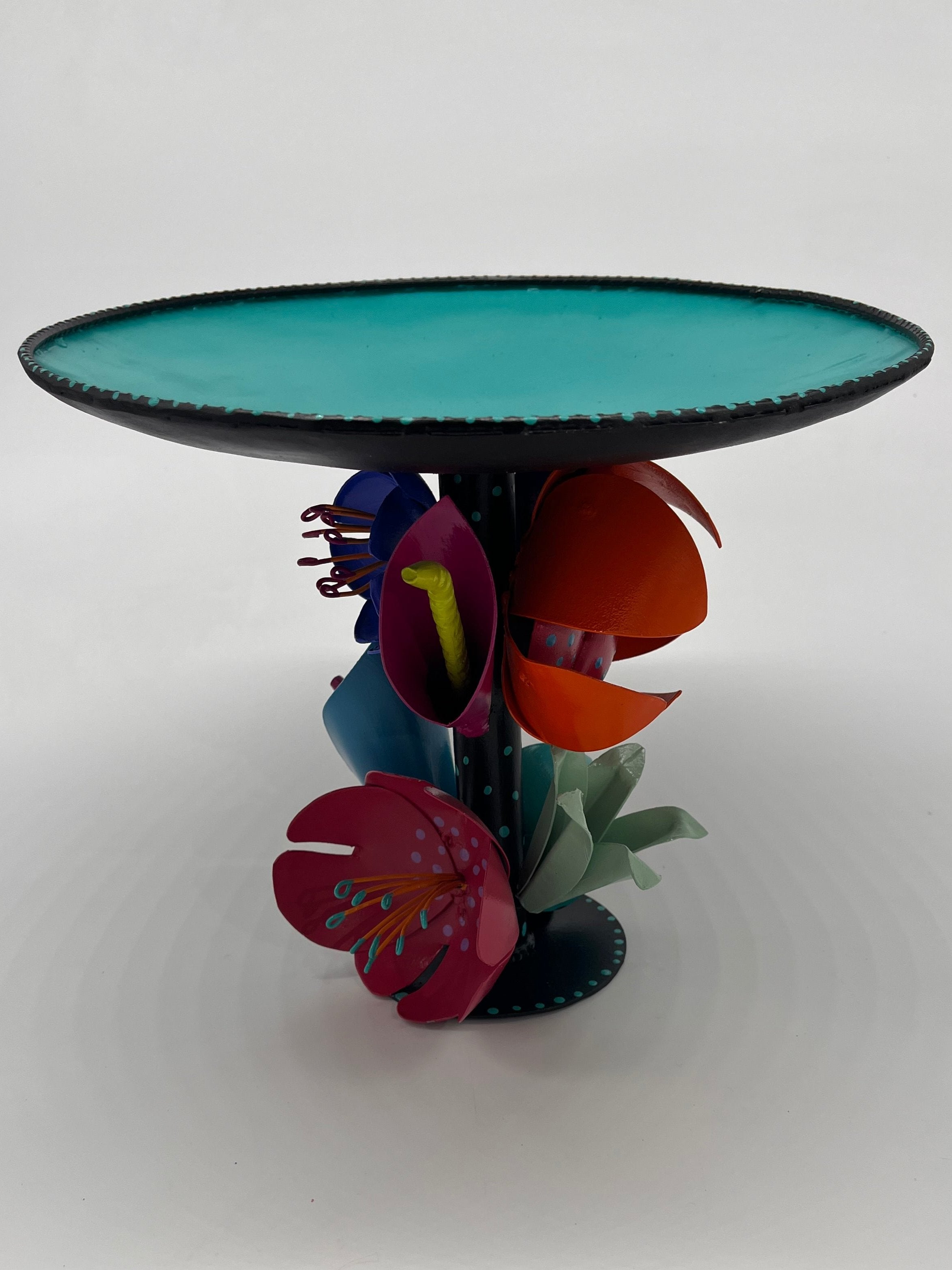 Fruit bowl with bouquet of flowers
