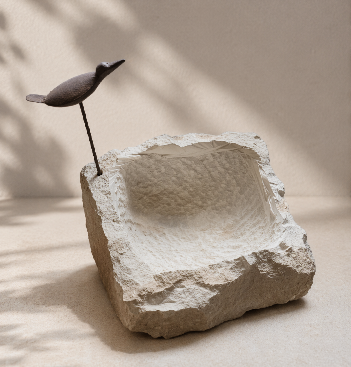 Baño de pajaros piedra